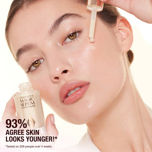 Charlotte Tilbury Magic Serum Crystal Elixir application on model